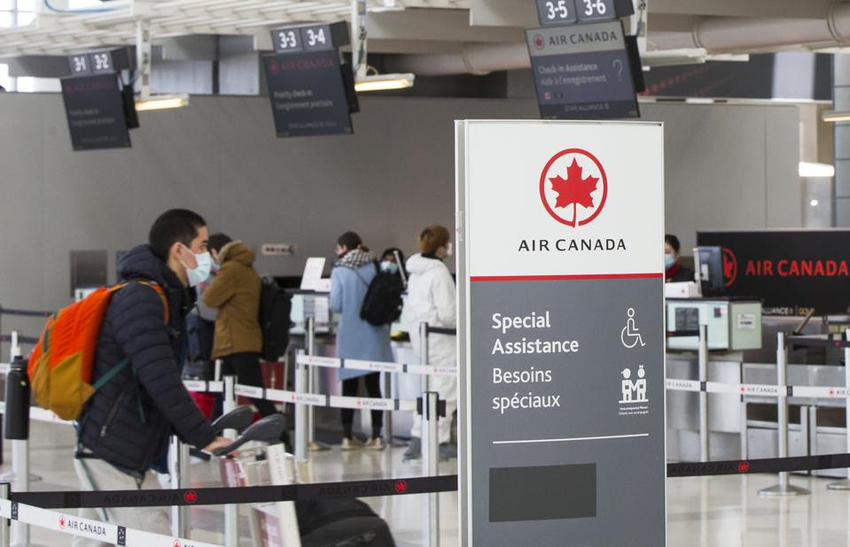 Canada extends travel restrictions into the new year